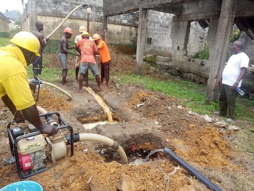 Draining of water bore hole at Aileru Primary School, Warri, Delta State