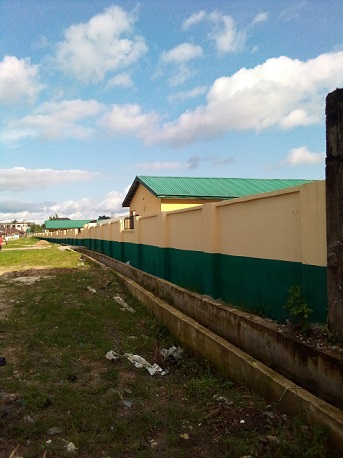 Side view of Aileru Primary School, Warri, Delta State, Nigeria after fencing with funding from Partnerschaft-Afrika